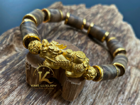 vong-tay-tram-huong-mix-ty-huu-bang-vang